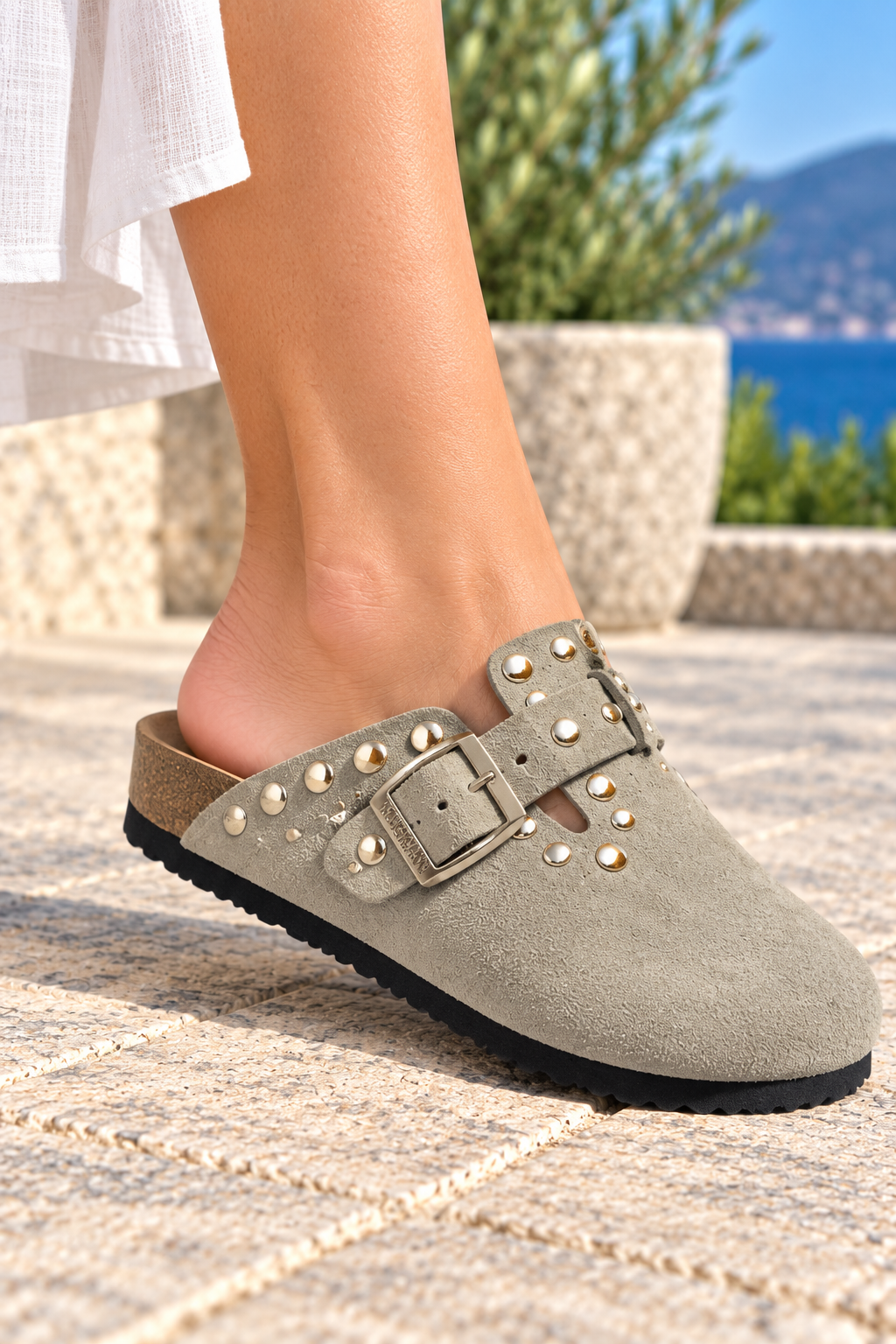 Neckermann N2725 sand suede sandal worn by a model outdoors, right foot